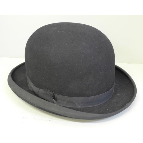 745 - A bowler hat, inner lining loose, a/f