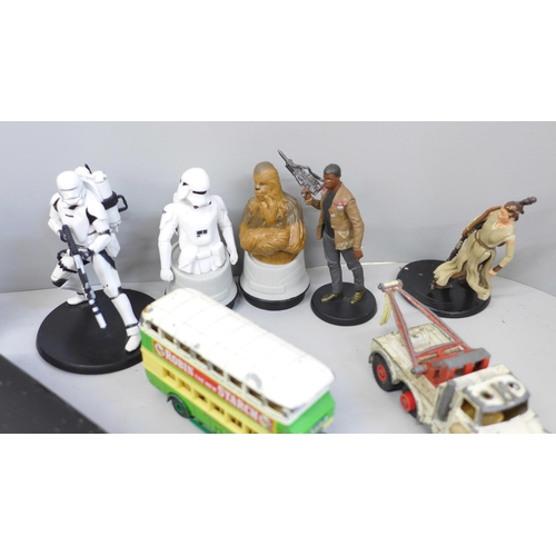 749 - A collection of die-cast model vehicles and Star Wars figures