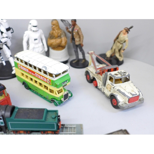 749 - A collection of die-cast model vehicles and Star Wars figures