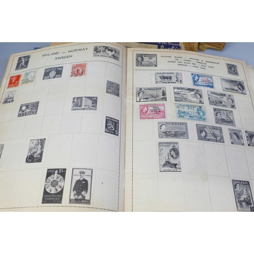 750 - A collection of stamps in two albums