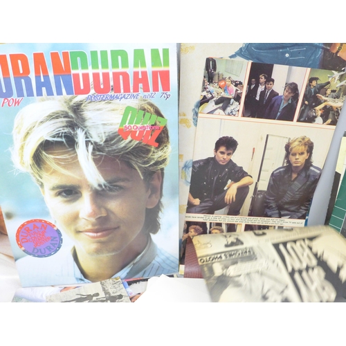 752 - Duran Duran memorabilia including singles, posters, a book and fan club newsletters