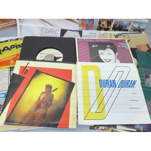 752 - Duran Duran memorabilia including singles, posters, a book and fan club newsletters