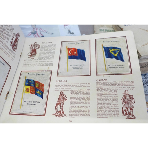 754 - A collection of cigarette cards, Kensitas silks National Flags, a large BDV League Colours Sunderlan... 