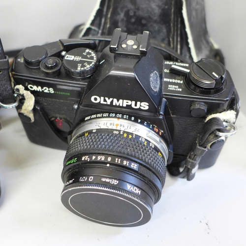 757 - Two cameras; Olympus OM-25 program with Olympus 28mm f=2.8 lens, also with 135mm f=3.5 lens, 50mm 1.... 