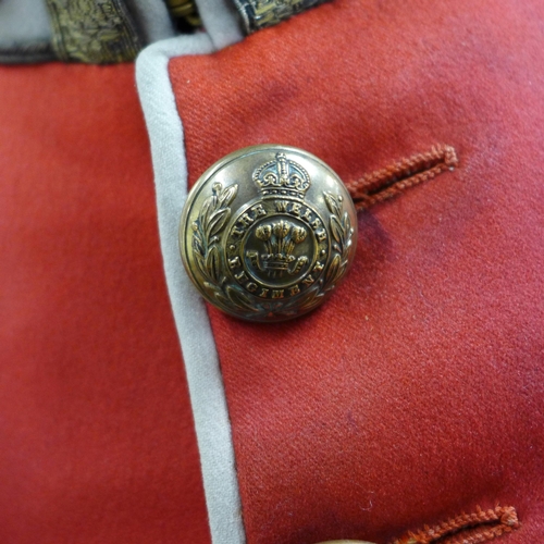 778 - A Welsh Regiment tunic, circa 1880s, lieutenant rank, motto Better Death Than Dishonour, on a manneq... 