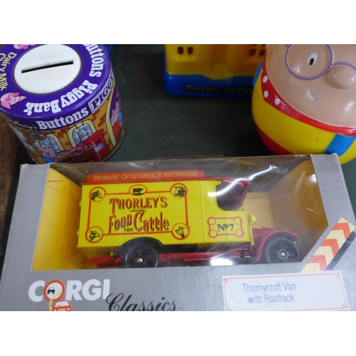 783 - A collection of McDonalds toys, five money boxes, a Nestle egg and a Corgi Classics vehicle, boxed