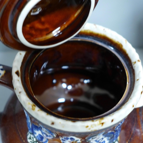 785 - A large bargeware teapot, spout restored and internal crack, one smaller teapot, largest dated 1908