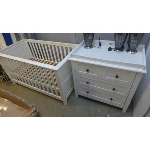 1634 - A Silver Cross white painted cot bed and chest of drawers * This lot is subject to VAT