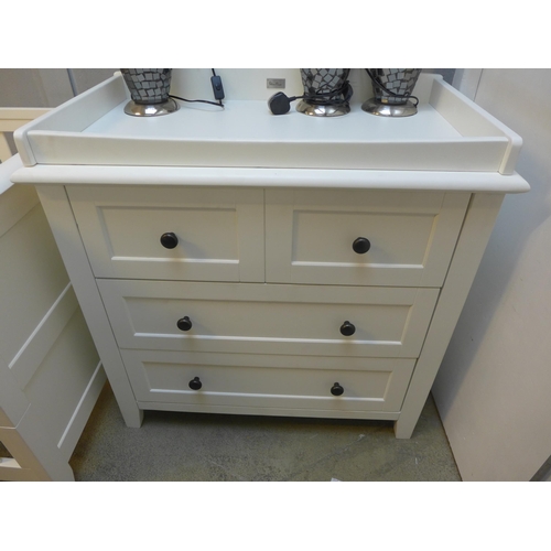 1634 - A Silver Cross white painted cot bed and chest of drawers * This lot is subject to VAT