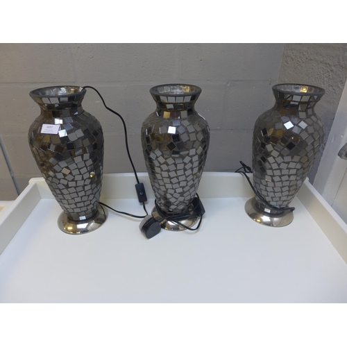 1637 - A set of three crackle effect vase lamps