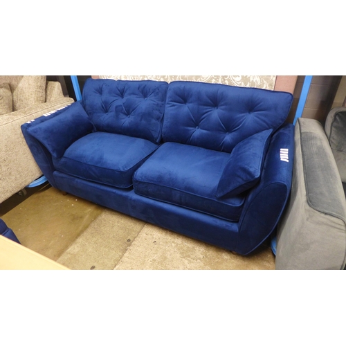 1318 - A pair of Hoxton blue velvet upholstered three seater sofas RRP £1598