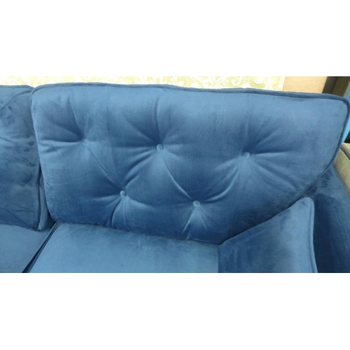 1318 - A pair of Hoxton blue velvet upholstered three seater sofas RRP £1598