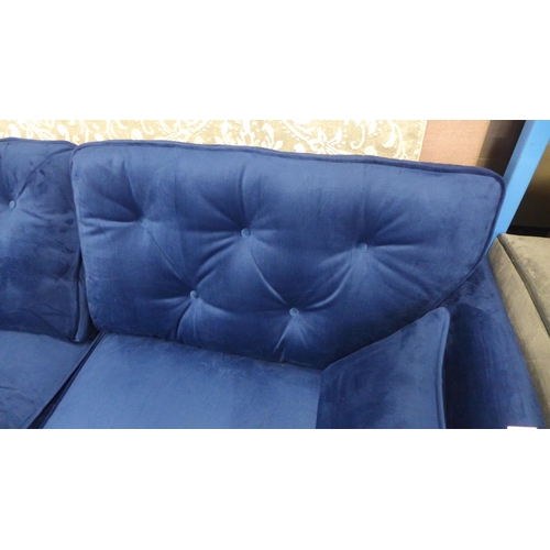 1321 - A Hoxton blue velvet upholstered three seater sofa RRP £799