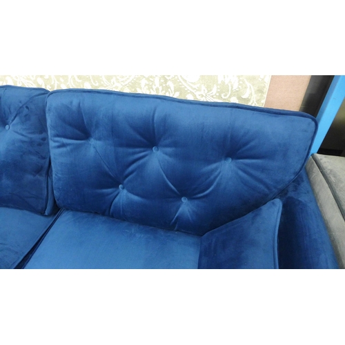 1324 - A Hoxton blue velvet upholstered three seater sofa RRP £799