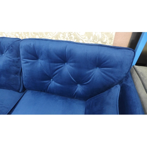 1325 - A Hoxton blue velvet upholstered three seater sofa RRP £799