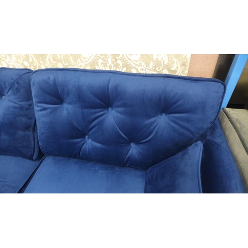 1327 - A Hoxton blue velvet upholstered three seater sofa RRP £799