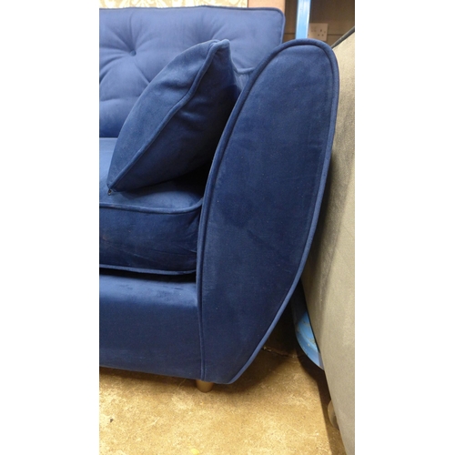 1328 - A Hoxton blue velvet upholstered three seater sofa RRP £799