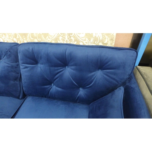 1328 - A Hoxton blue velvet upholstered three seater sofa RRP £799