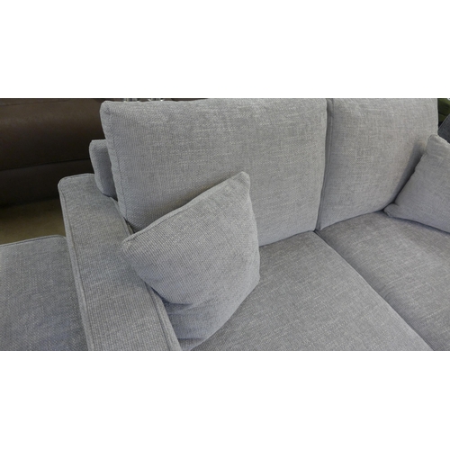 1334 - A Shada Hopsack silver three seater sofa and ottoman footstool RRP £1398