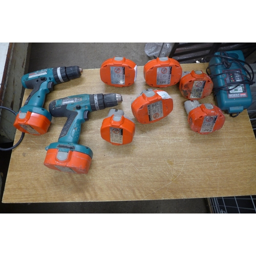 2009 - Makita batteries, two Makita drills and charger