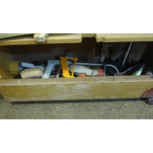 2053 - A carpenter's tool chest and woodworking tools including saws, screw drivers, sprit level, chisels e... 