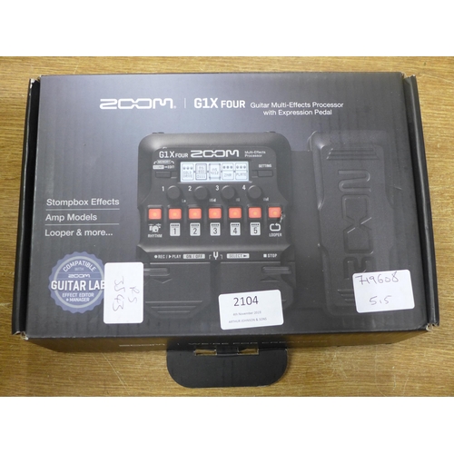 2104 - A Zoom G1X four guitar multi effects processor with expression pedal and an Alesis Multimix 8 USB FX... 