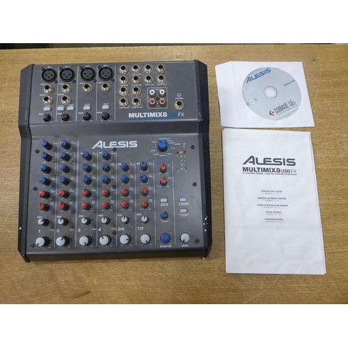 2104 - A Zoom G1X four guitar multi effects processor with expression pedal and an Alesis Multimix 8 USB FX... 