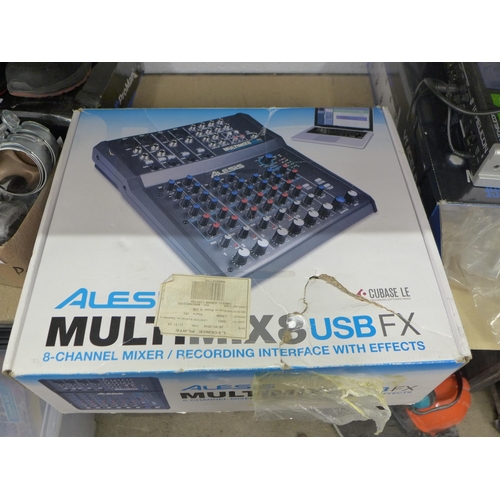 2104 - A Zoom G1X four guitar multi effects processor with expression pedal and an Alesis Multimix 8 USB FX... 