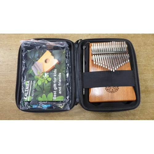 2108 - A 17 key Laqula Kalimba with protective case, soft bag, playing accessories and information on how t... 