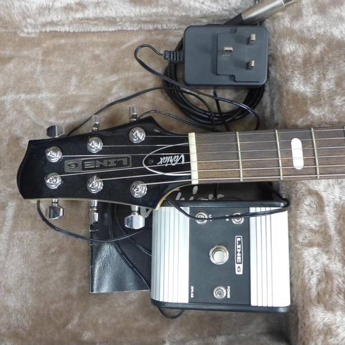 2142 - A Line 6 Variax electric guitar in a plush protective hard case and a Line 6 JTV Variax cabled power... 