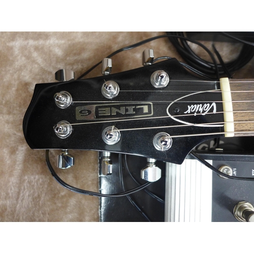 2142 - A Line 6 Variax electric guitar in a plush protective hard case and a Line 6 JTV Variax cabled power... 