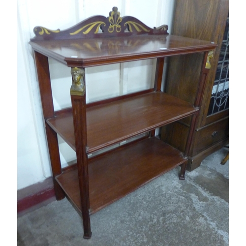 146 - A 19th Century French Empire style mahogany and brass inlaid three tier dumb waiter