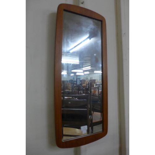 16 - A teak framed mirror