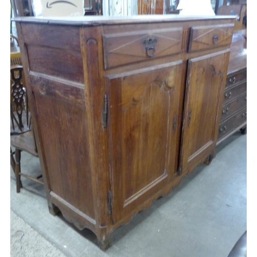 163 - A 19th Century French fruitwood cupboard