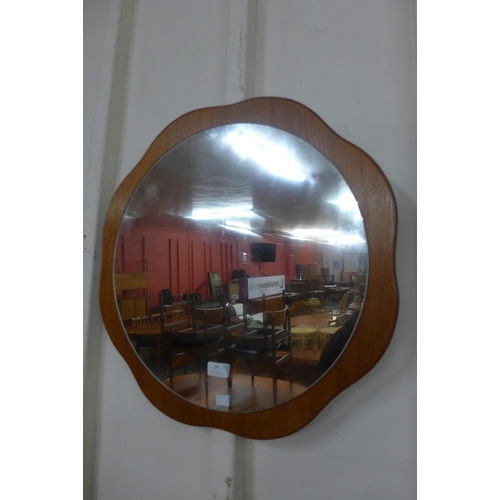 19 - A teak framed mirror