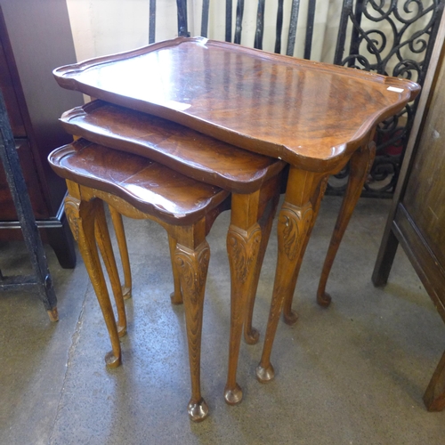 197 - A burr walnut nest of tables and an oak pot cupboard