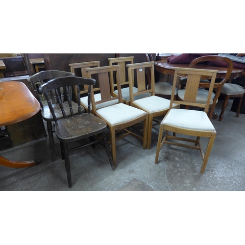 221 - A set of five oak chapel chairs and a pair of beech chairs