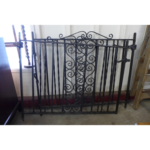 241 - A pair of painted wrought iron garden gates