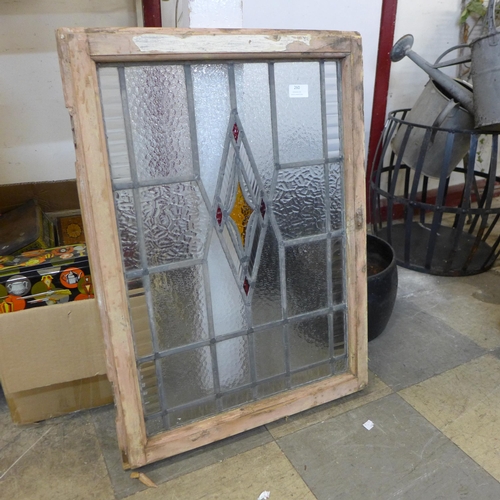 260 - A framed Art Deco stained glass window