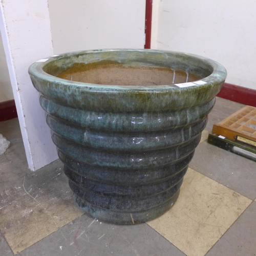 261 - A large green glazed terracotta planter