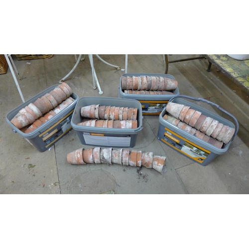 277 - A large quantity of small terracotta plant pots, approx. 200