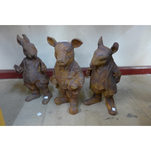 279 - A set of three cast iron Beatrix Potter garden figures