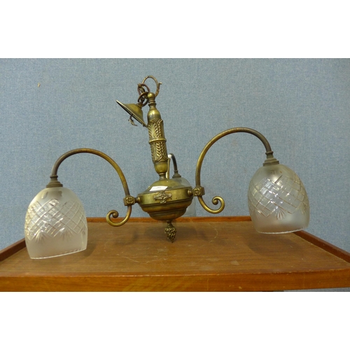 281 - An Art Deco style brass three branch chandelier