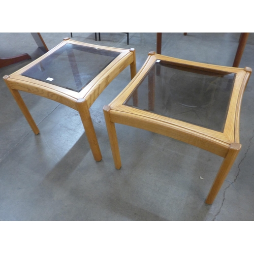 30 - A pair of Ercol Blonde glass topped ash coffee tables