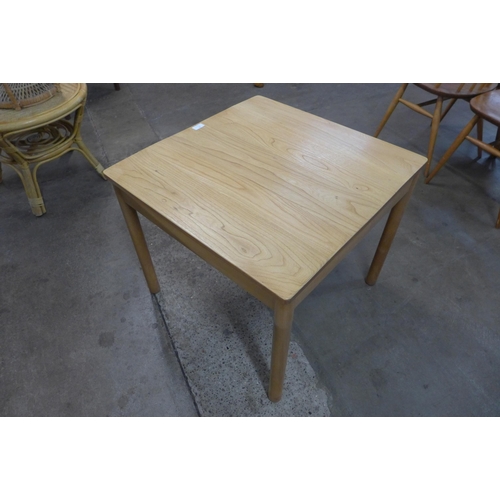 32 - An Ercol Blonde ash coffee table