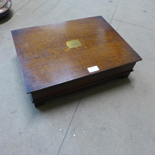 323 - An oak cased E.P.N.S canteen of cutlery with faux ivory handles