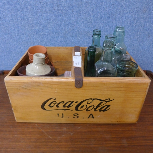 328 - A pine Coca-Cola trug, assorted vintage glass bottles, etc.