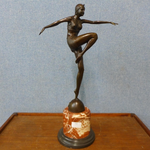 348 - An Art Deco style bronze figure of an exotic female dancer, on rouge marble socle