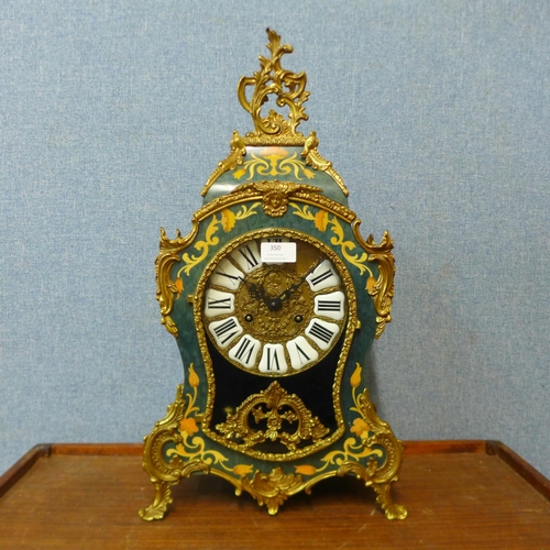 350 - A French Boulle style gilt metal and simulated inlaid mantel clock