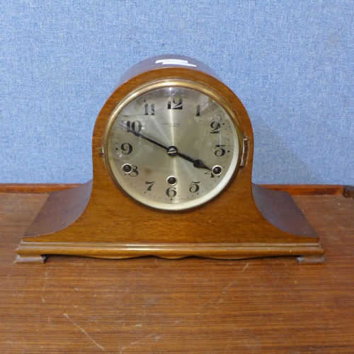 355 - An early 20th Century oak mantel clock, the dial signed Barwick & Haugas, Keightly